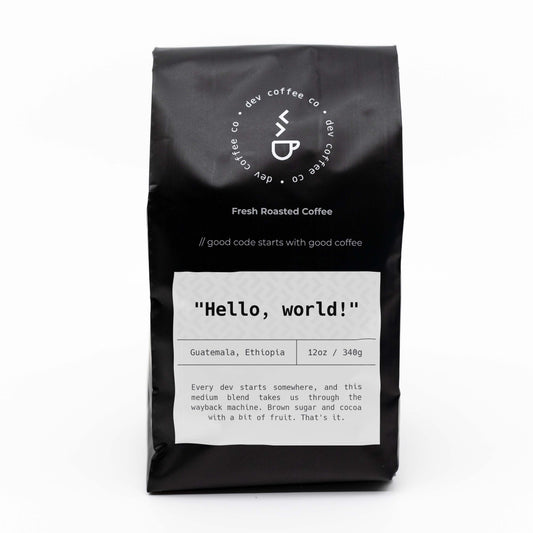Front of bag of 12oz "Hello, world!" Premium Coffee from Dev Coffee Co. Good code starts with good coffee.