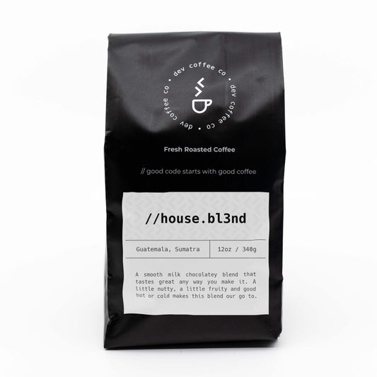 Front of bag of 12oz House Blend Premium Coffee from  Dev Coffee Co. Good code starts with good coffee.